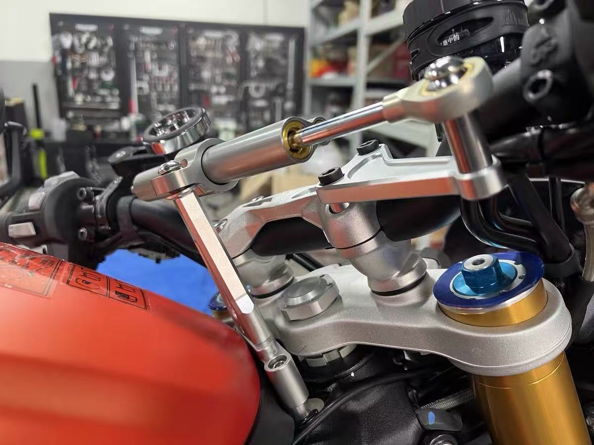 حامل مثبت لذراع التوجيه للدراج - مراجعة Motorcycle Gear Airbag وسعره